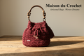Borsa bordeaux con scritta Maison du Crochet
